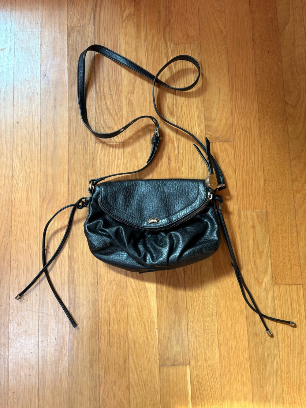 Juicy Couture black shoulder bag with pink interior